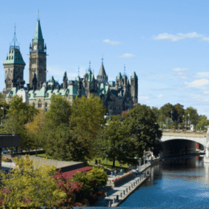 Parliament buildings by river in Ottawa